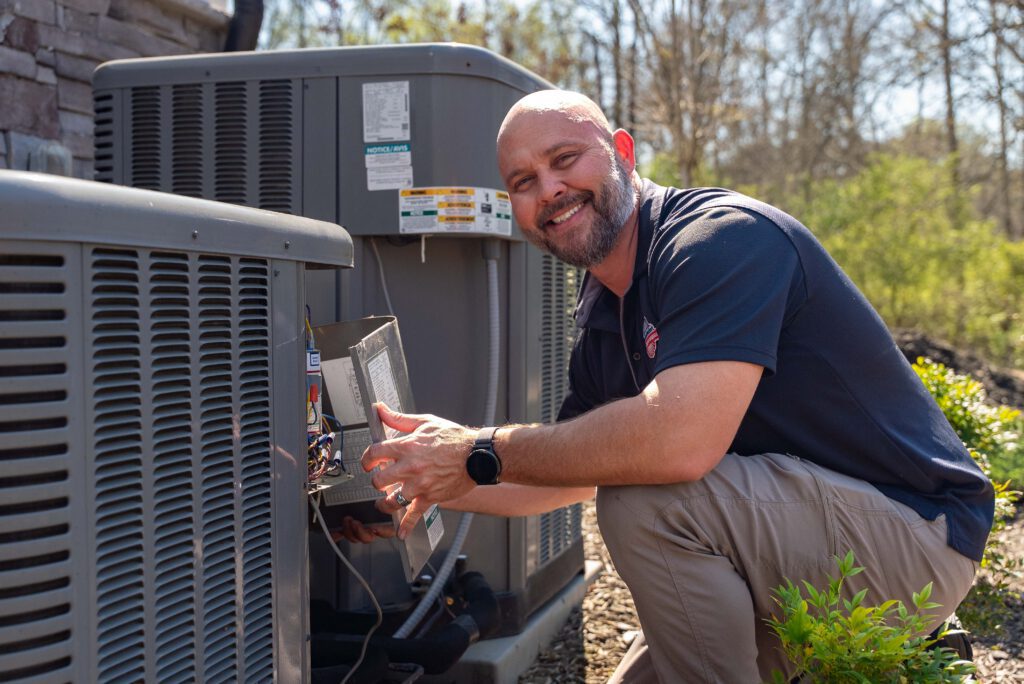 man smiling ac unit